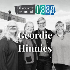 Photo of Geordie Hinnies (4 white women) in black and white with Angel of the North Behind them